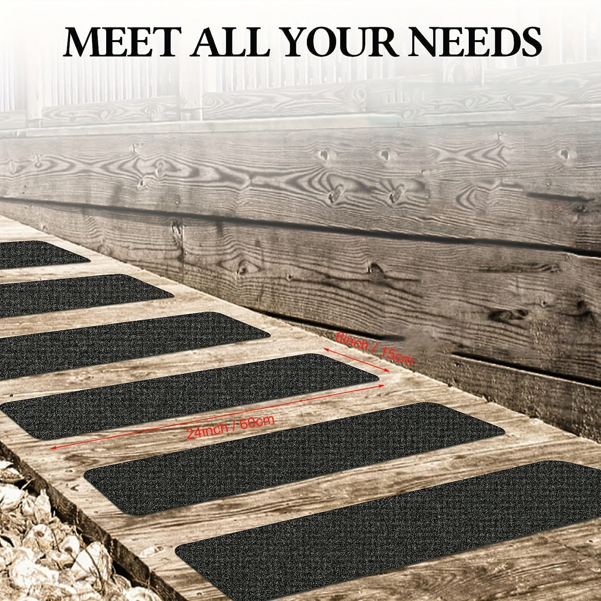 Black anti-slip stair tread strips arranged on wooden staircase steps