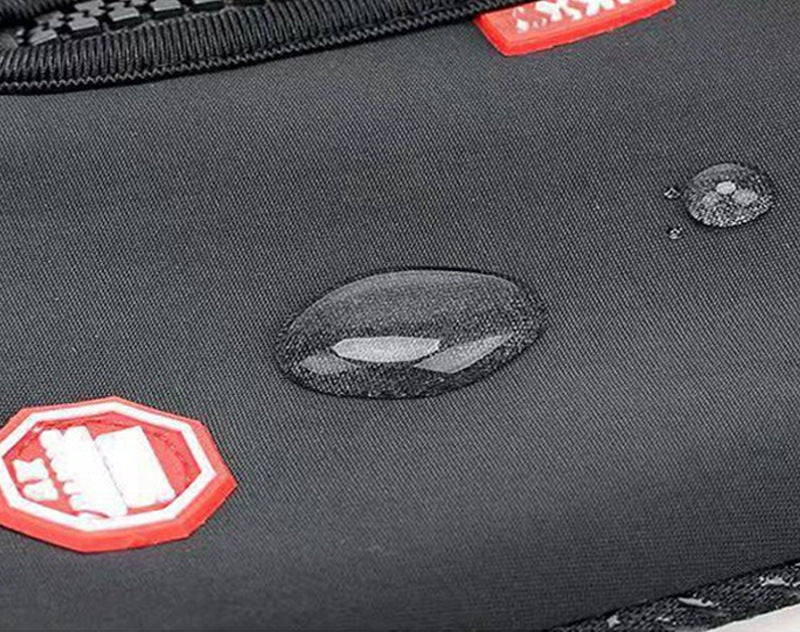 Black glove fabric with waterproof droplet patch and reflective logo detail.