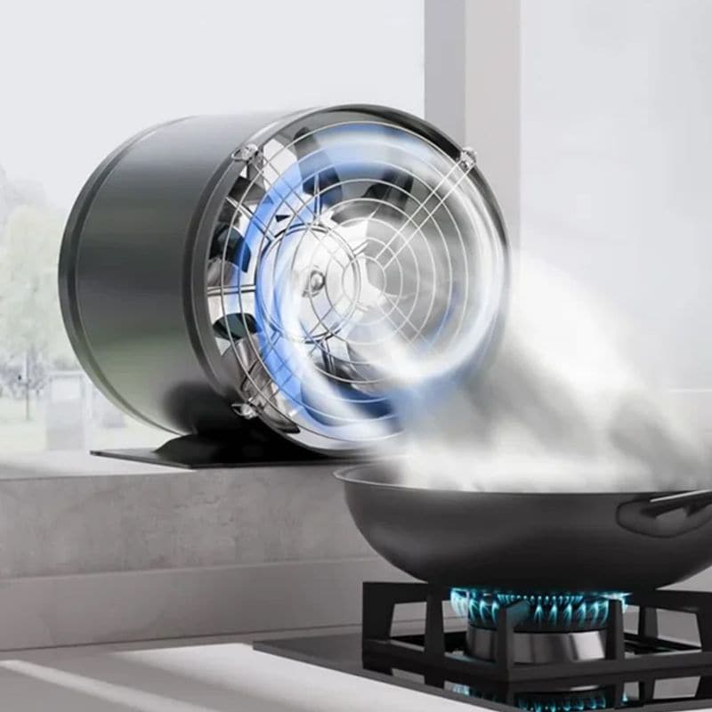 Black cylindrical kitchen exhaust fan with front fan grille and spinning blades