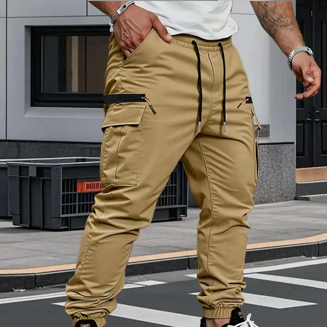 Khaki tapered cargo pants with drawstring waist, cargo side pockets, elastic cuffs