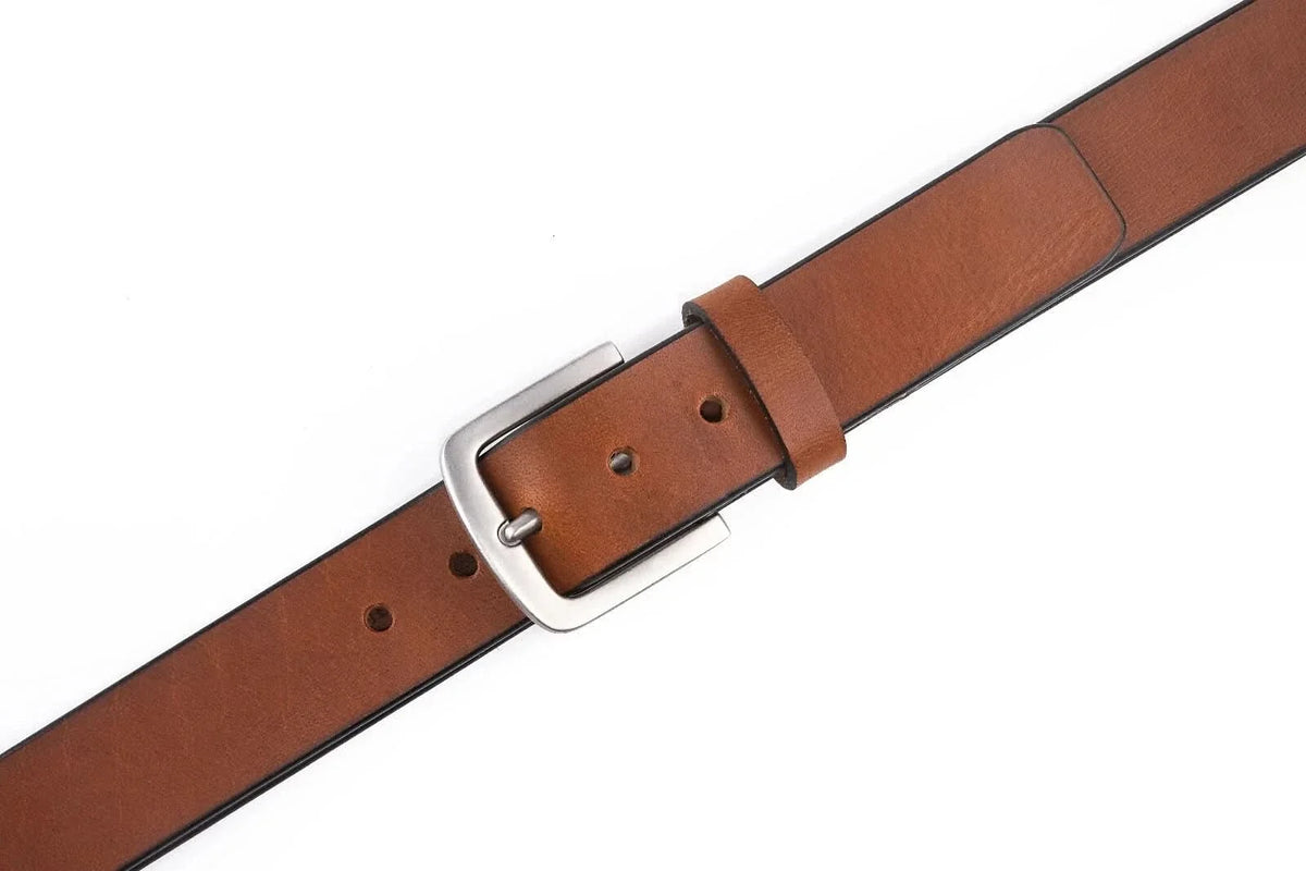 Brown leather belt strap with punched holes and silver-tone buckle