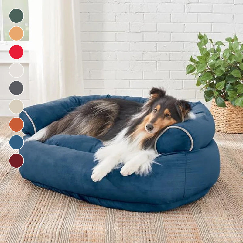 Blue bolster dog bed with rolled sides and beige piping detail