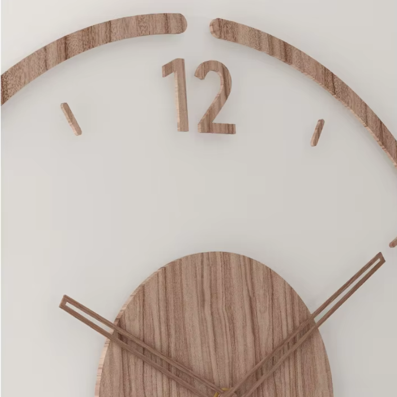 Solid wood wall clock close-up of arched dial and wooden hour numerals 1 and 12