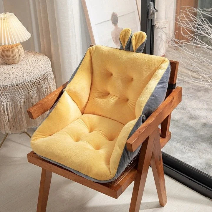 Sciatica relief cushion with yellow padded backrest and contoured seat
