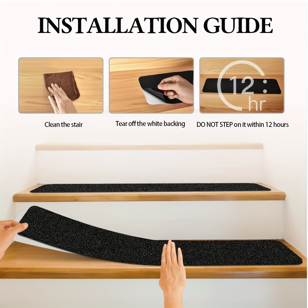 Black anti-slip stair tread strips being installed on light wood stairs