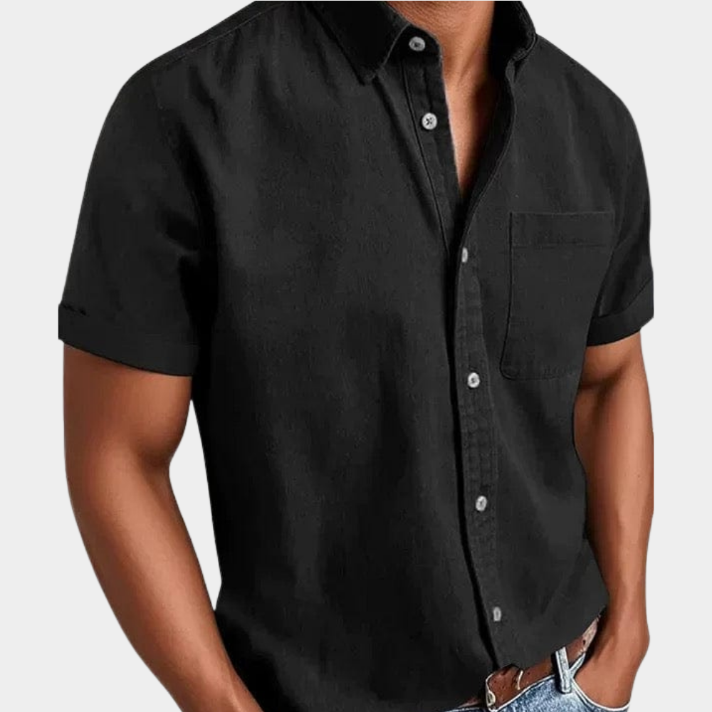 Men's short-sleeve button-up shirt in black with chest pocket and button front