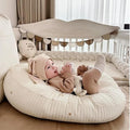 Ergonomic cotton baby lounger cover, cream with star and moon prints