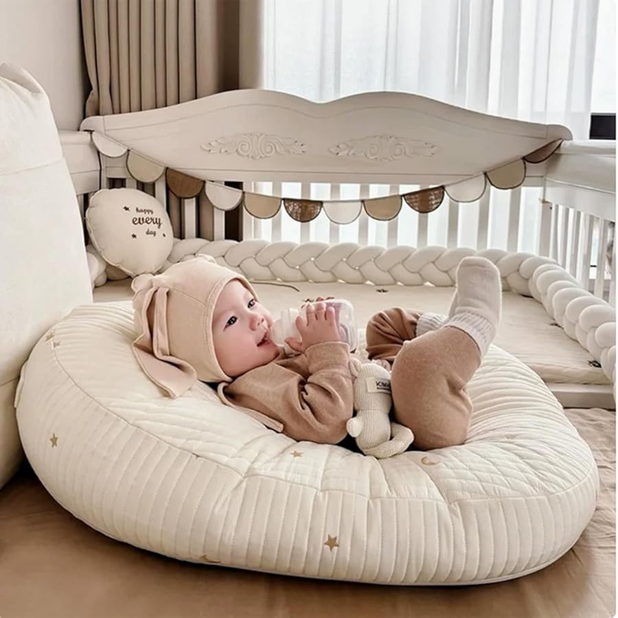 Ergonomic cotton baby lounger cover, cream with star and moon prints