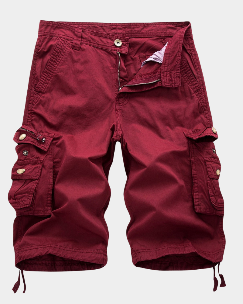 Men's cargo shorts in red with zip fly, button waist, and side flap cargo pockets