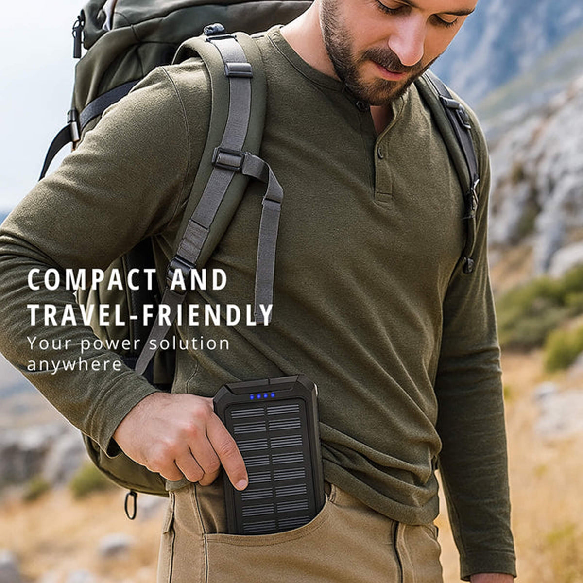 Black solar waterproof power bank with built-in solar panel, held near backpack