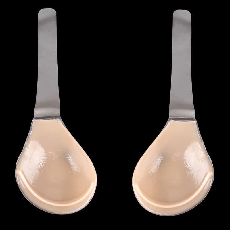 Pair of adhesive silicone bra cups with narrow straps, nude beige