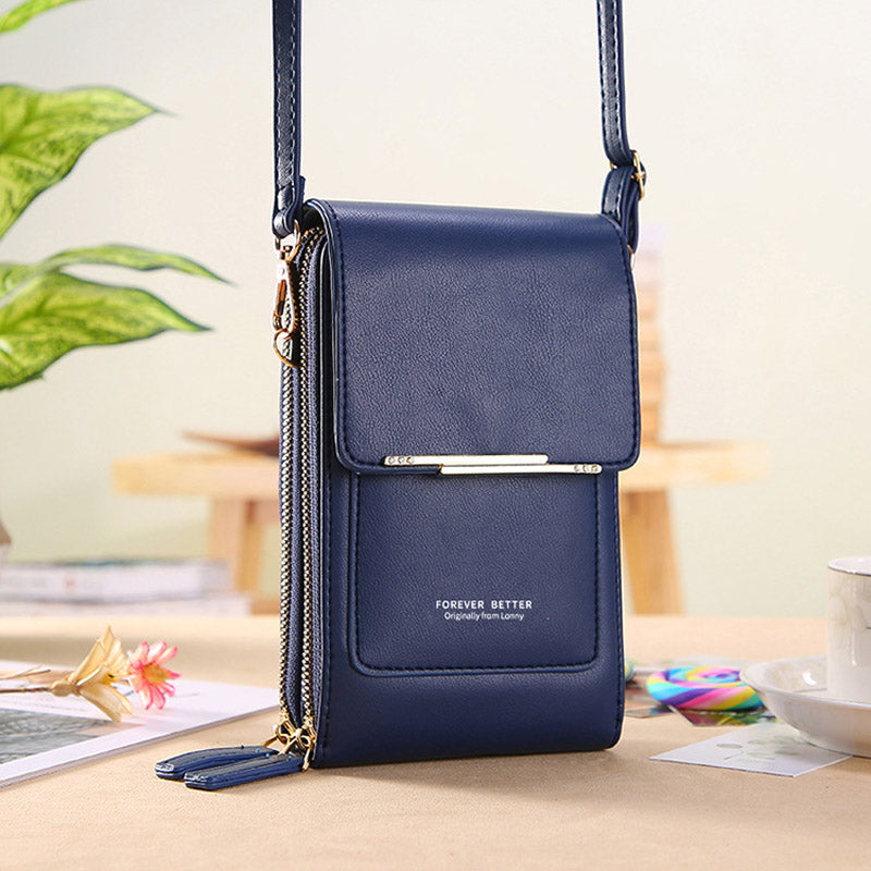 Anti-theft leather crossbody bag in blue, front flap with gold-tone bar closure.