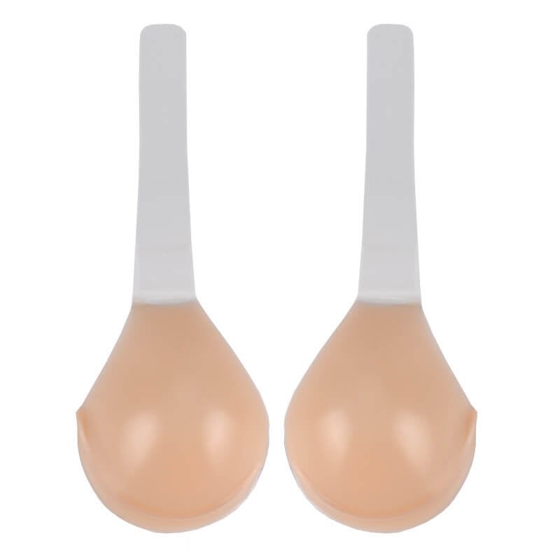Two adhesive silicone bra cups with white straps, nude beige