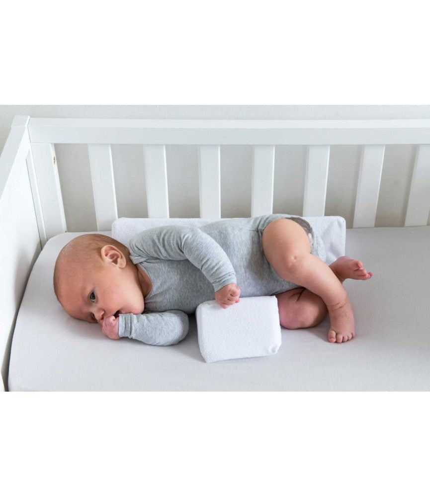 Adjustable baby side sleeper pillow with grey center and white wedge cushions