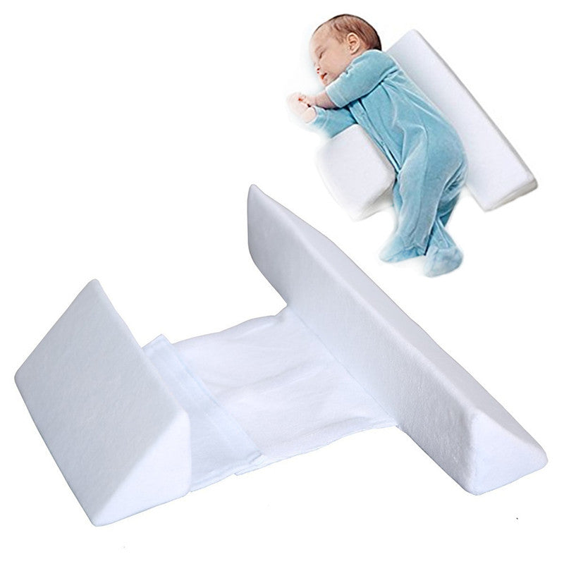 Adjustable baby side sleeper pillow with white wedge cushions and upright side block