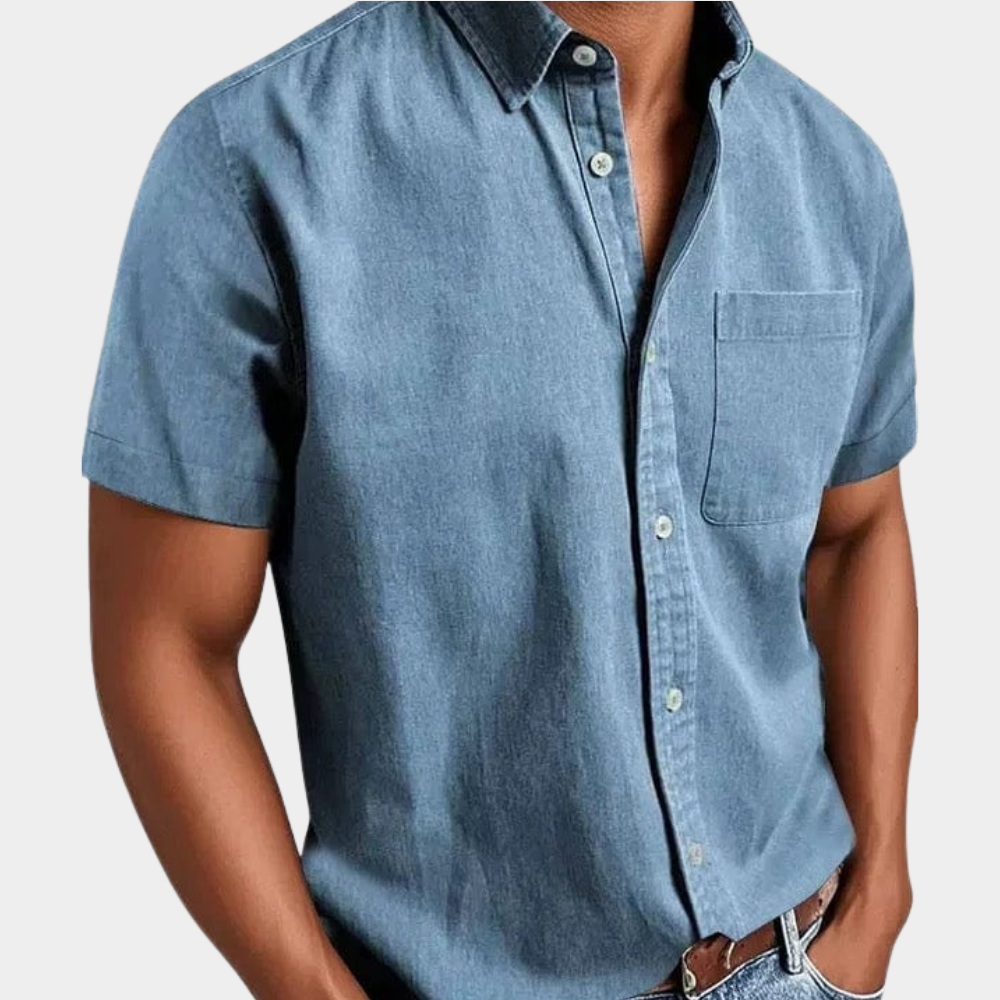 Men's short-sleeve button-up shirt in light blue with chest pocket and button front