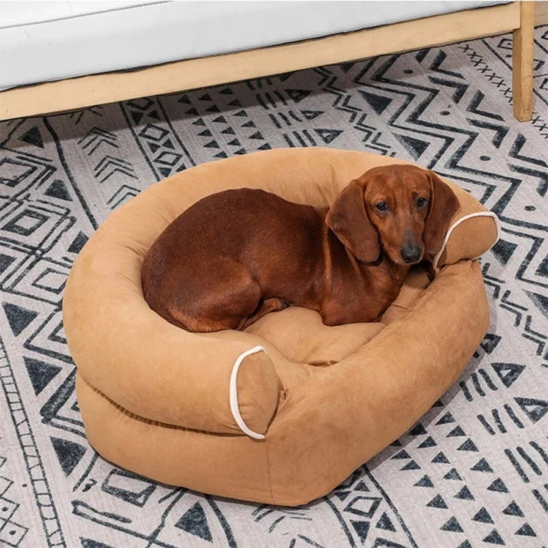 Bolster dog bed with rolled sides, khaki fabric and beige piping detail