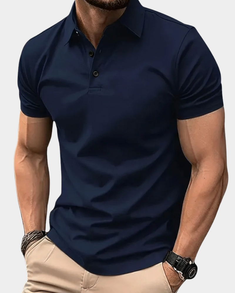 Navy blue solid polo shirt with short sleeves, button placket, and ribbed collar