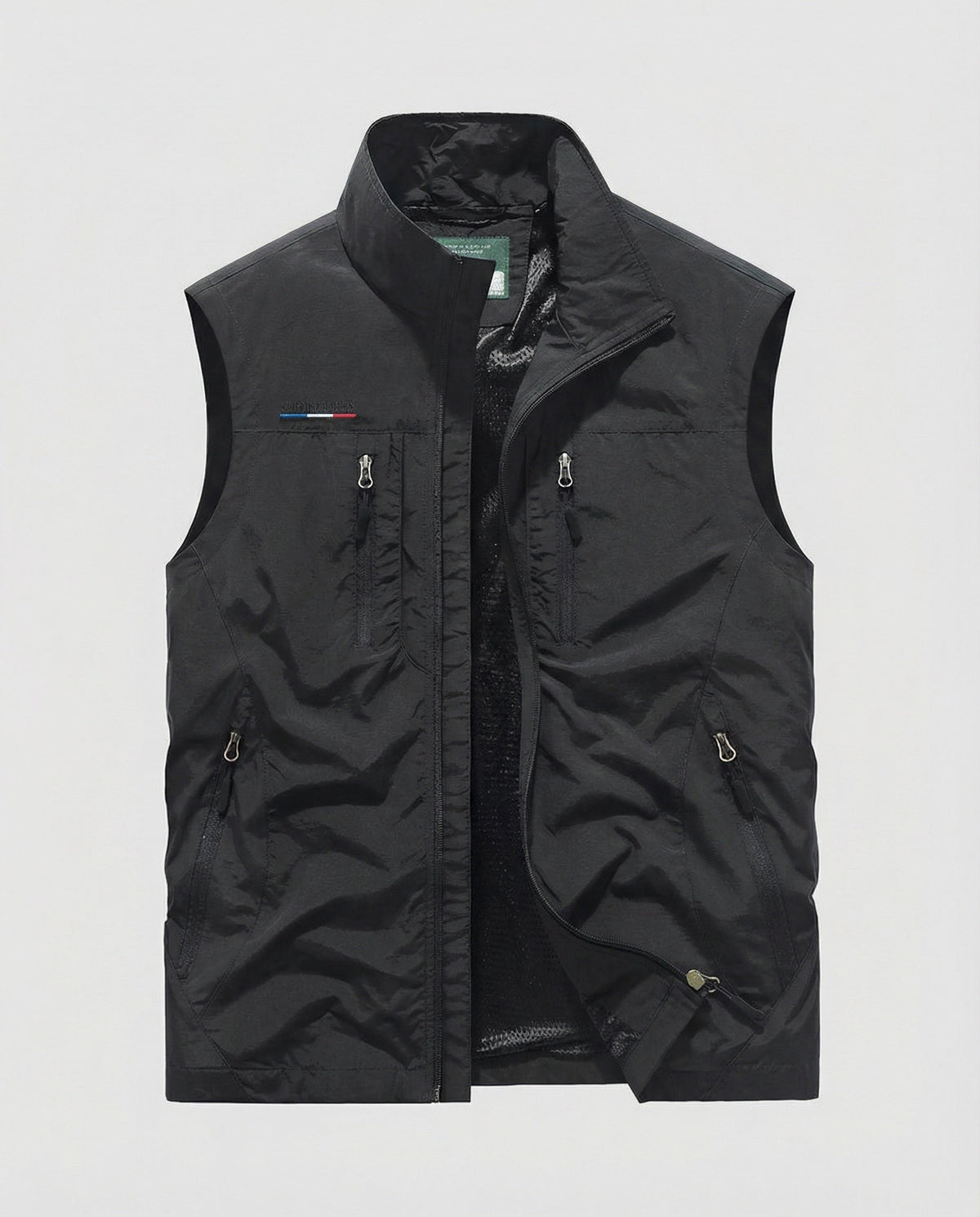 Black utility gilet vest with stand collar, front zip, and side zip pockets.