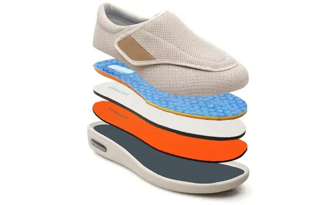 Beige slip-on mesh diabetic shoe with removable insole layers and air-vent outsole