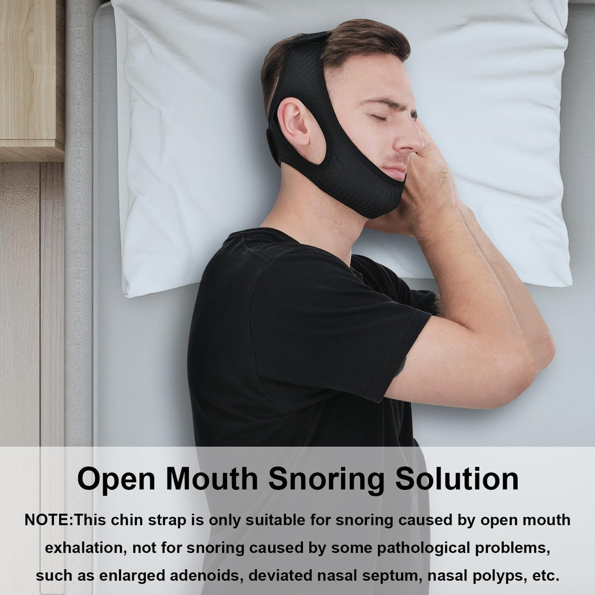 Black chin strap around chin and head for sleep, worn by person resting