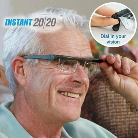Adjustable reading glasses with clear lenses and black frame, held at the bridge