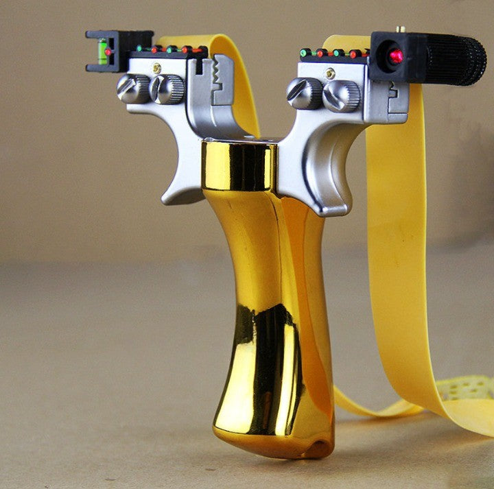 Gold laser slingshot with chrome silver body, yellow band and black barrel