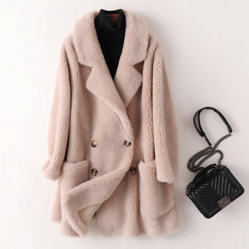 Plush double-breasted coat in beige with notched lapels and buttoned front