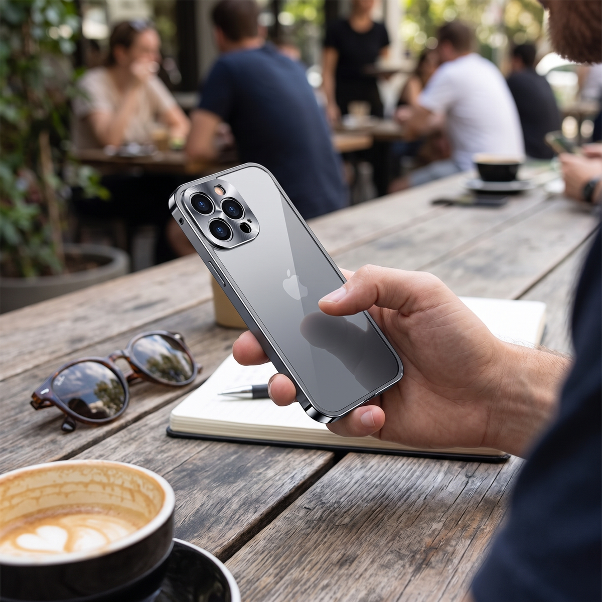 Silver aluminum CNC iPhone case in hand with back camera cutouts