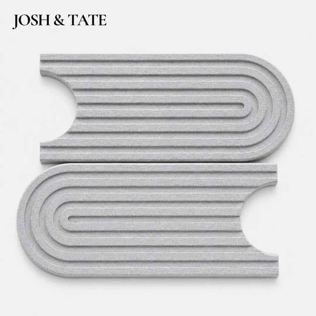 Dark gray diatomite faucet splash pad mat with channel ridges and cutouts