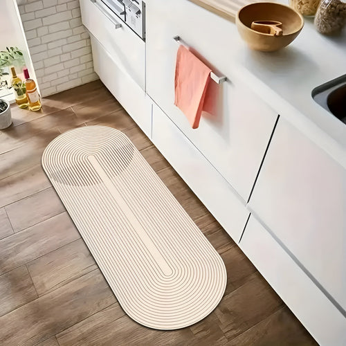 Quick-dry bath mat with oval shape and concentric stripe pattern, light gray