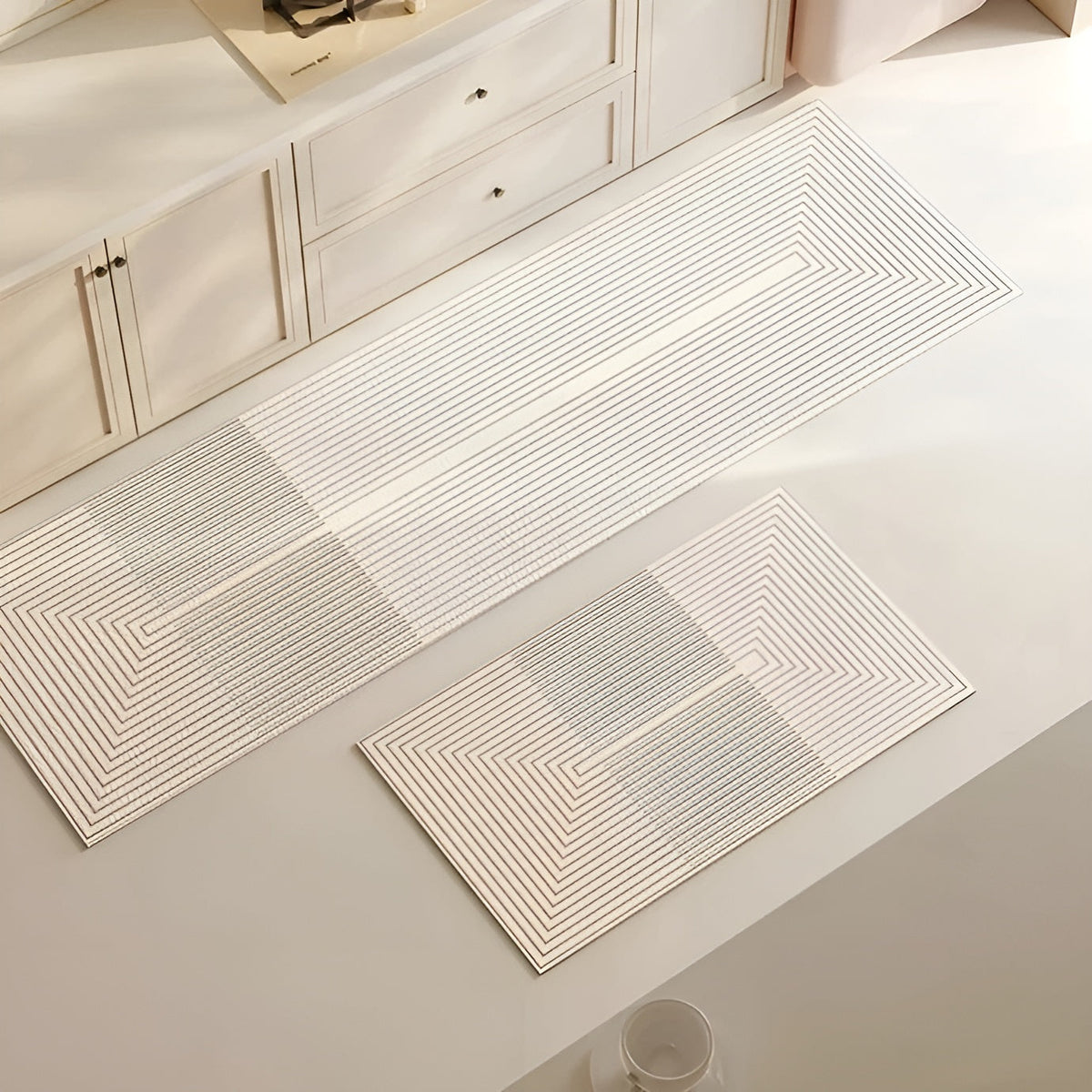 Quick-dry bath mat set with rectangular mats featuring chevron line pattern, light gray