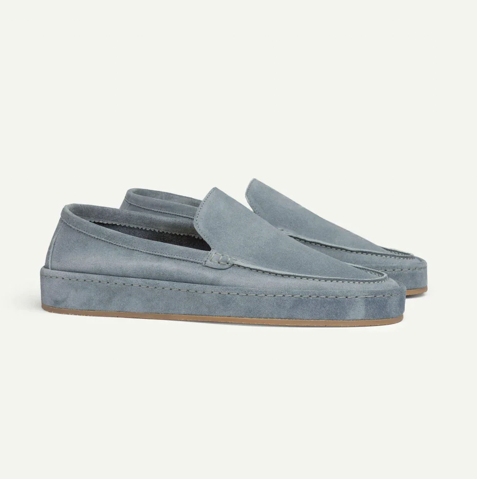 Light blue suede slip-on loafers with cushioned insole