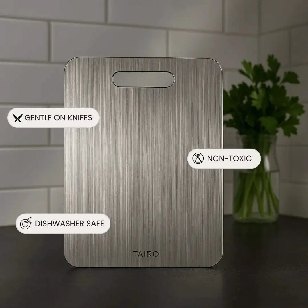 Titanium cutting board with handle slot, vertical brushed metal finish
