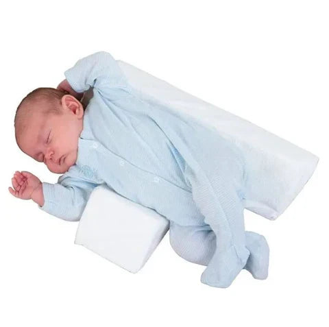 Adjustable baby side sleeper pillow with white wedge supports for side sleeping