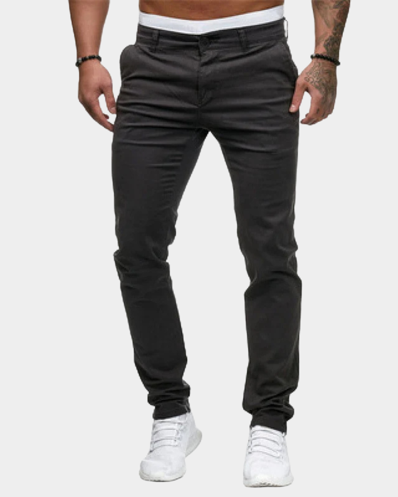 Dark gray slim tapered chinos with front pockets and button closure
