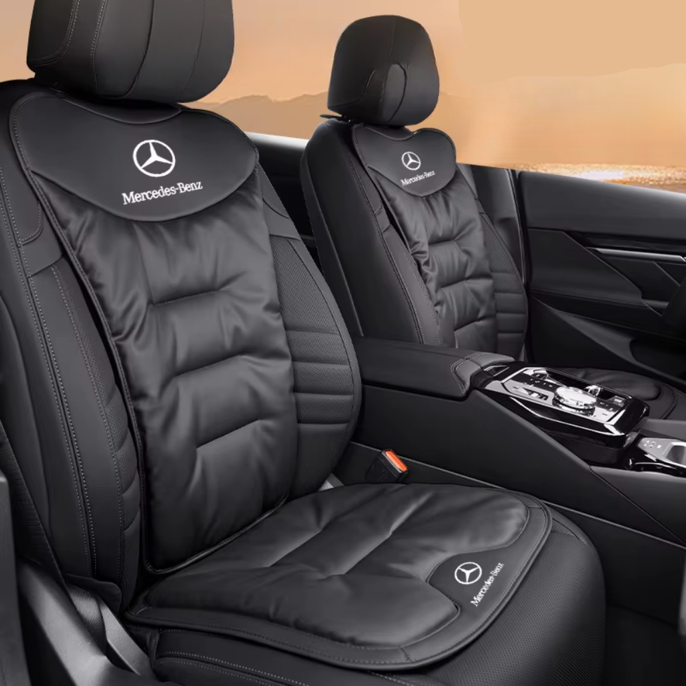 Ergonomic car seat cushion with lumbar support, black quilted panel with Mercedes-Benz logo.