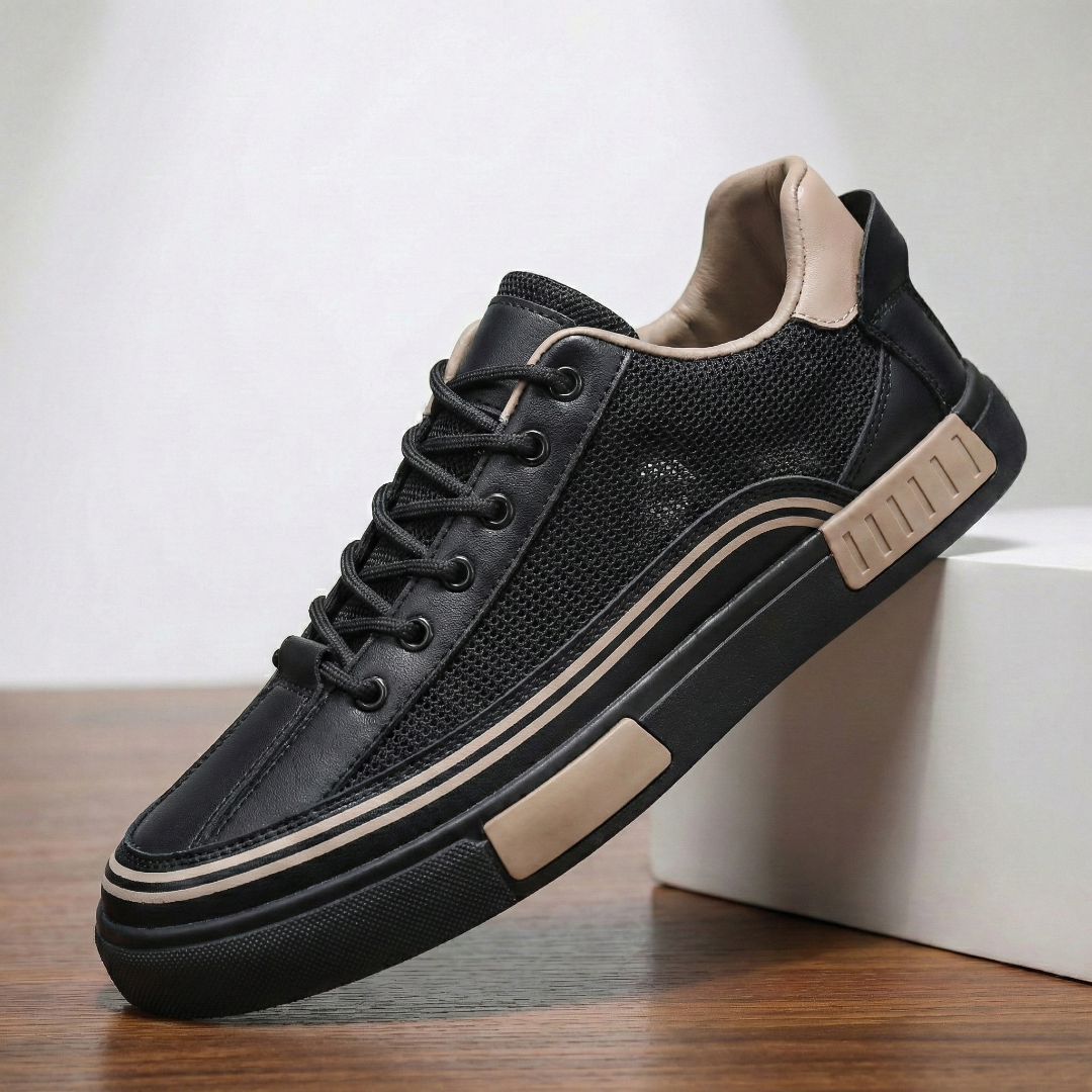 Black perforated mesh sneaker with tan stripe trim and cushioned lace-up upper