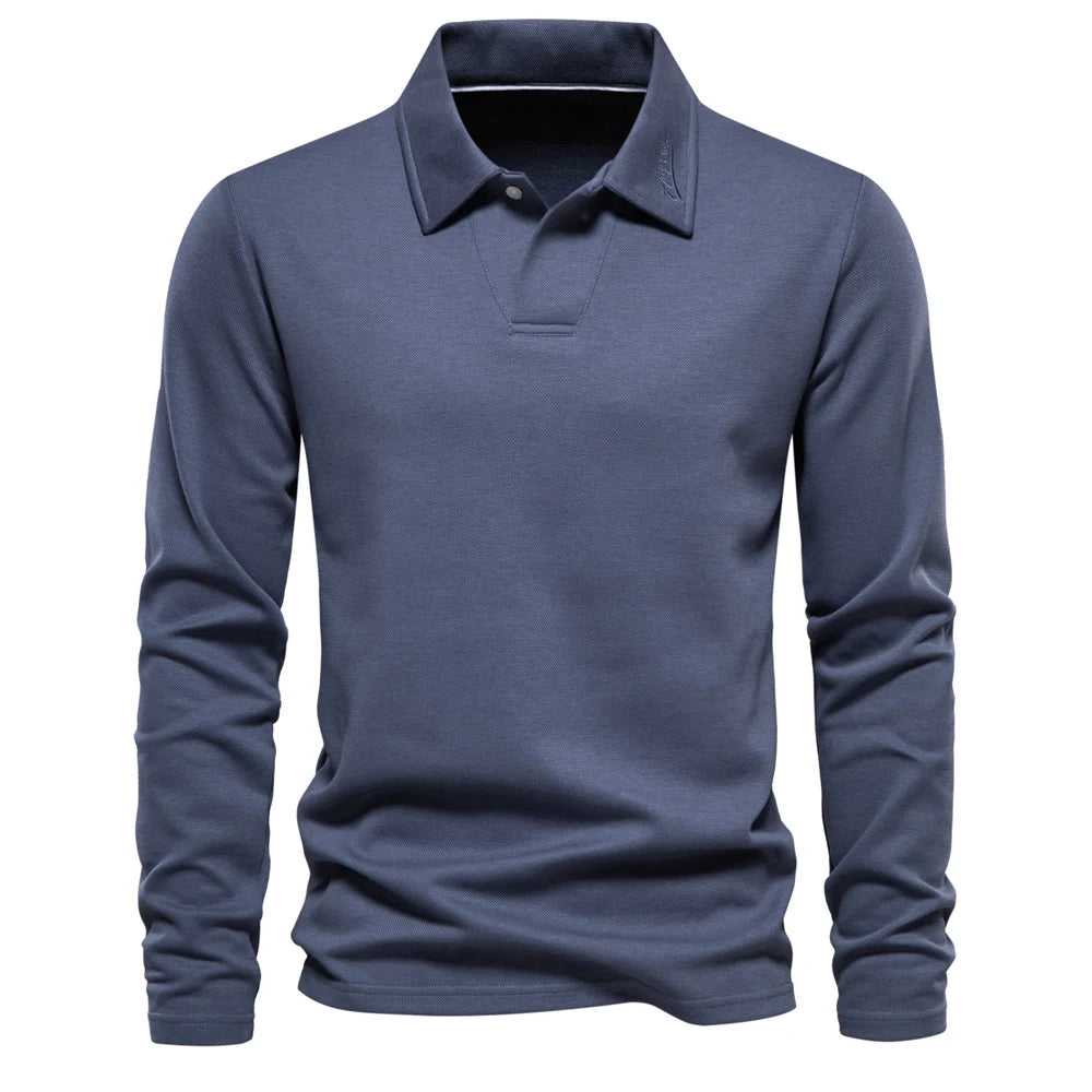 Blue long-sleeve knit polo shirt with buttoned collar and short placket