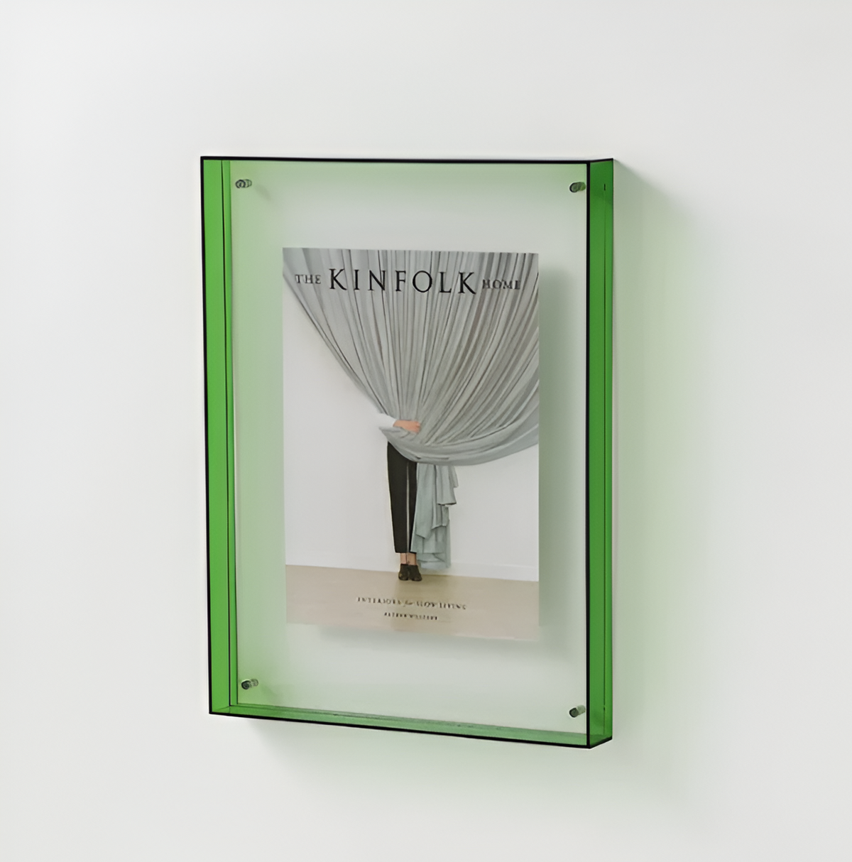 Green floating photo frame with clear acrylic front and centered fashion photo