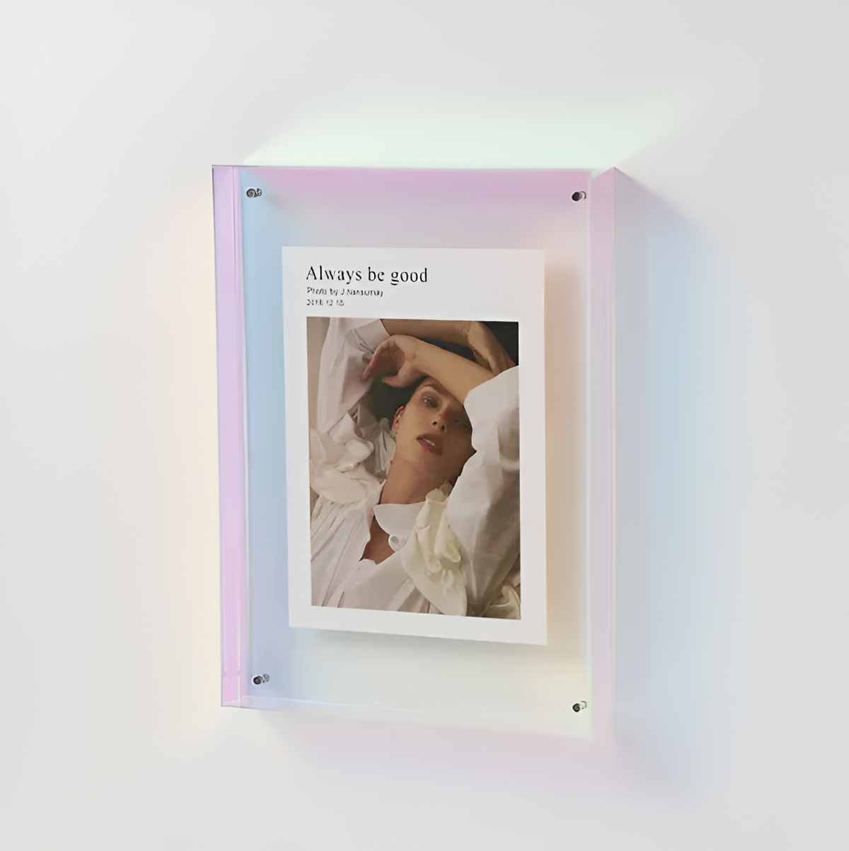 Light pink floating photo frame with clear acrylic front and portrait photo