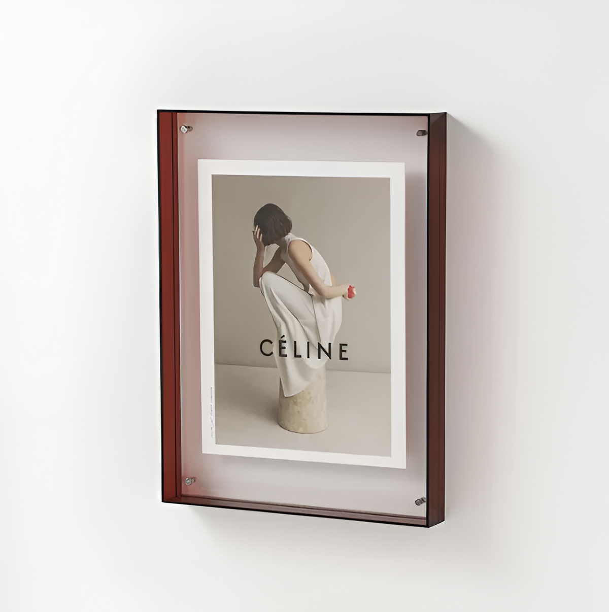 Dark brown floating photo frame with clear acrylic front and monochrome photo