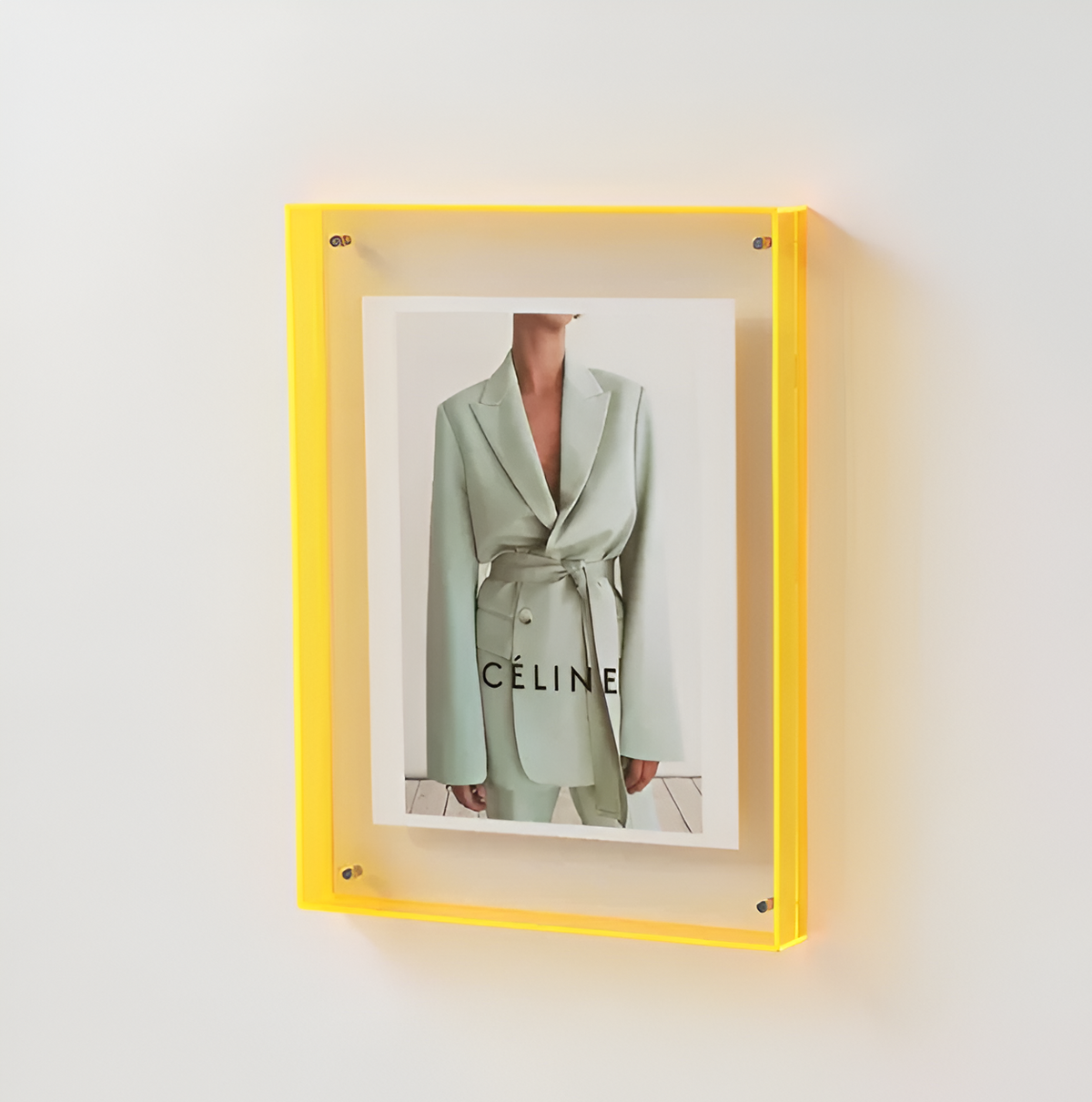Yellow floating photo frame with clear acrylic front and fashion photo print