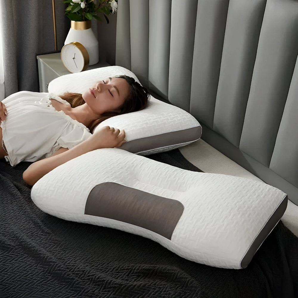 Neck contour sleeping pillow, white textured design with dark gray support insert.