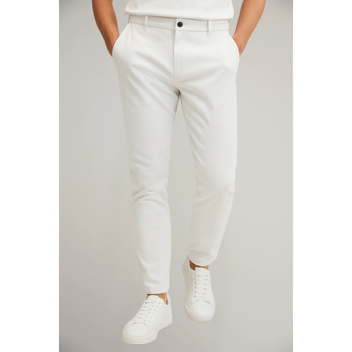 Slim-fit tailored trousers in white, with belt loops, button waist and tapered legs