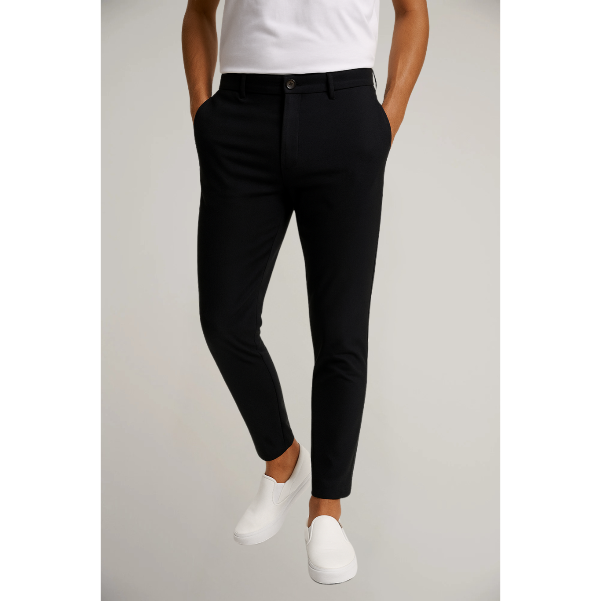 Slim fit tailored trousers, black with front button and belt loops.