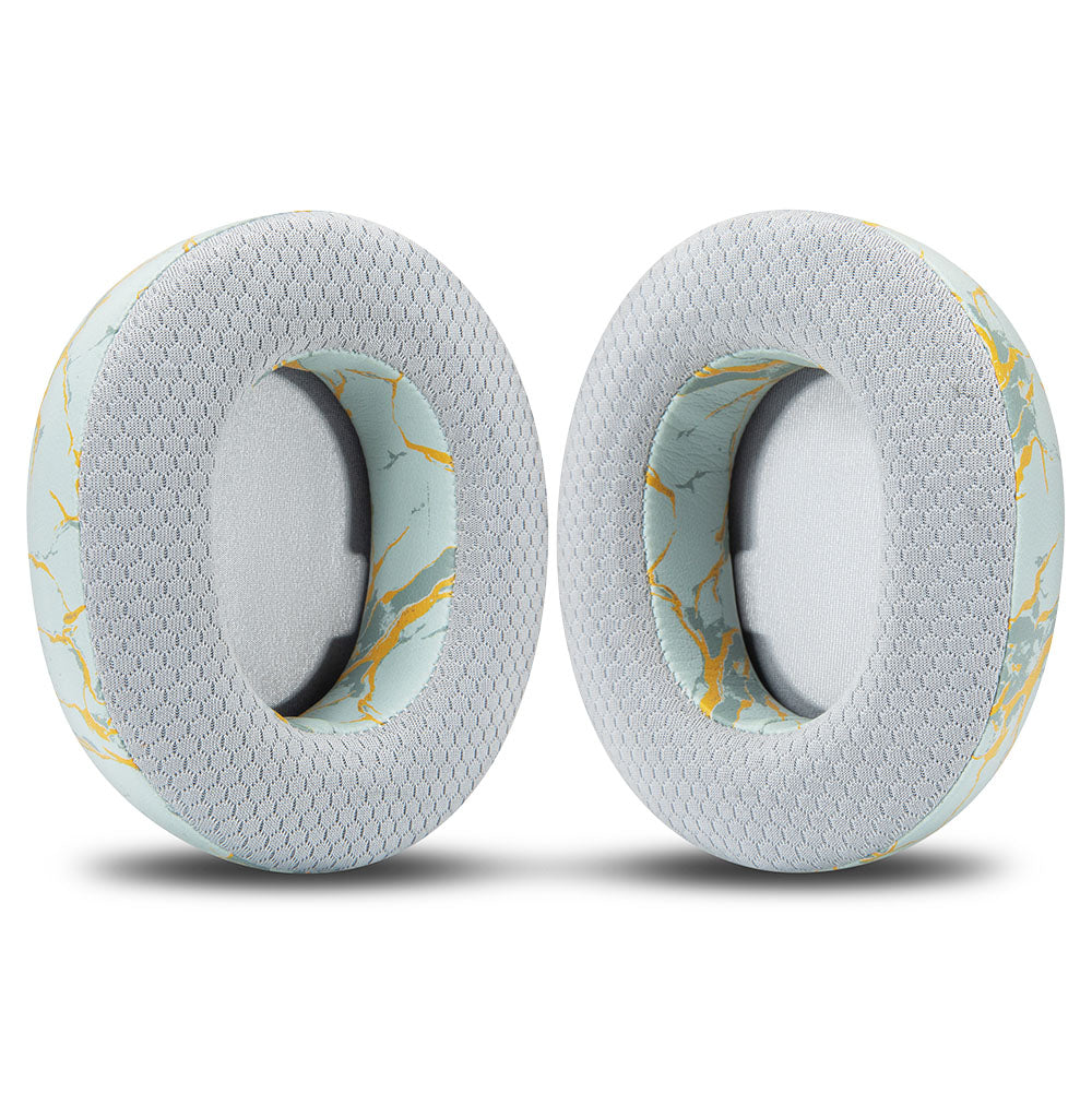 Pair of white replacement earpads with light blue map-style pattern, oval ear openings