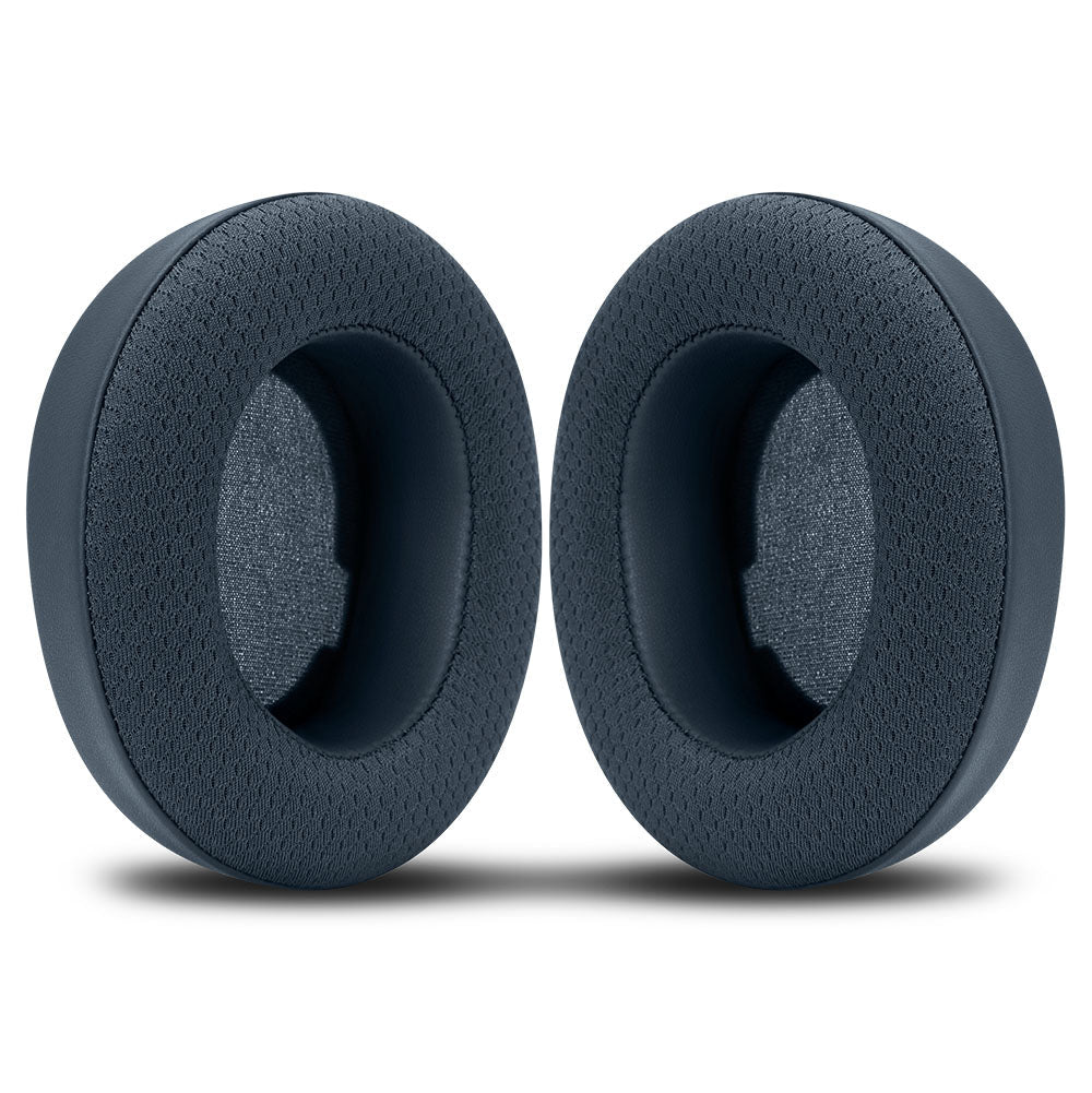 Pair of dark gray circular replacement earpads with textured outer foam and inner mesh