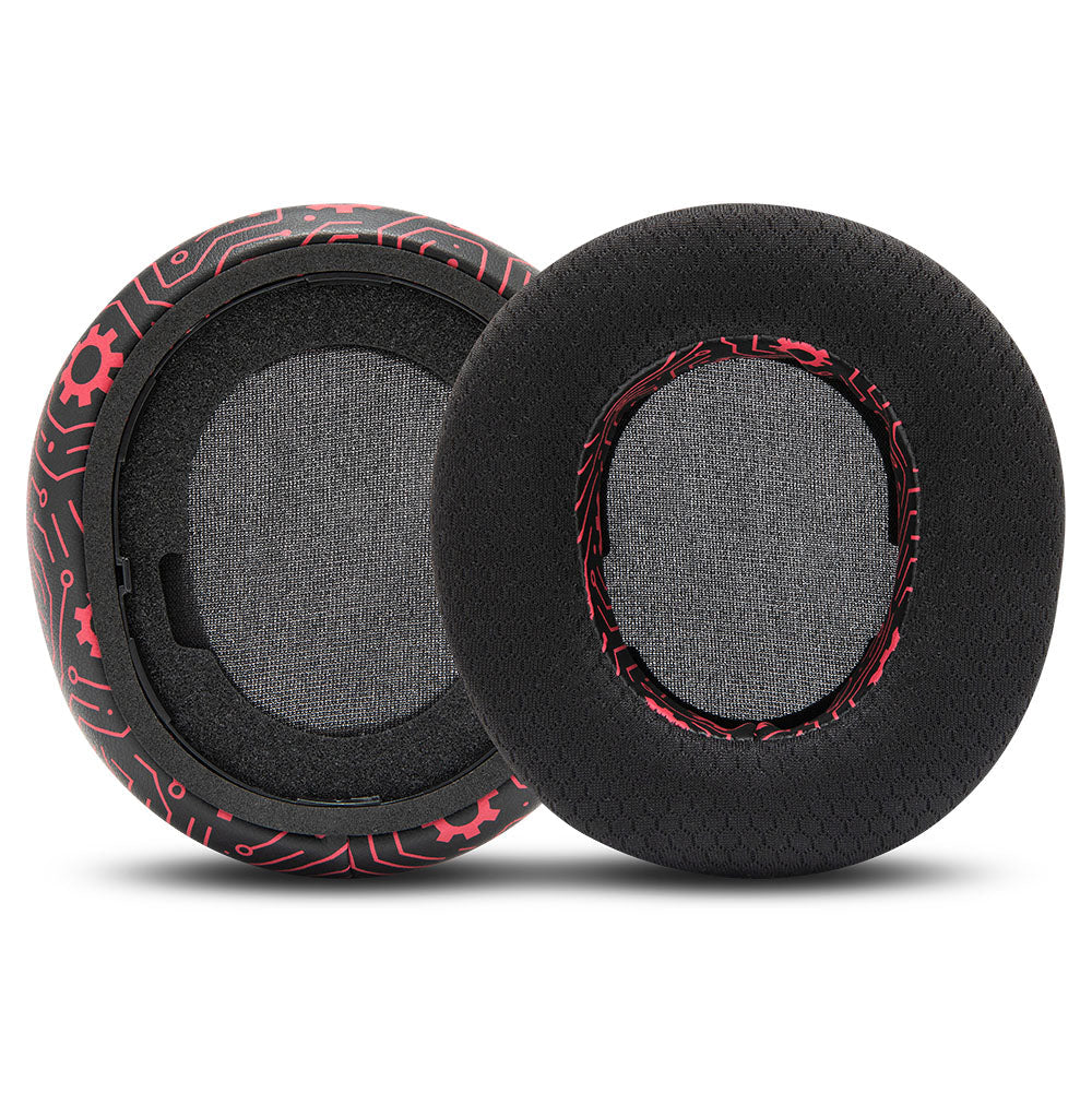 Close-up of black replacement earpads with red stitched border and gray speaker opening