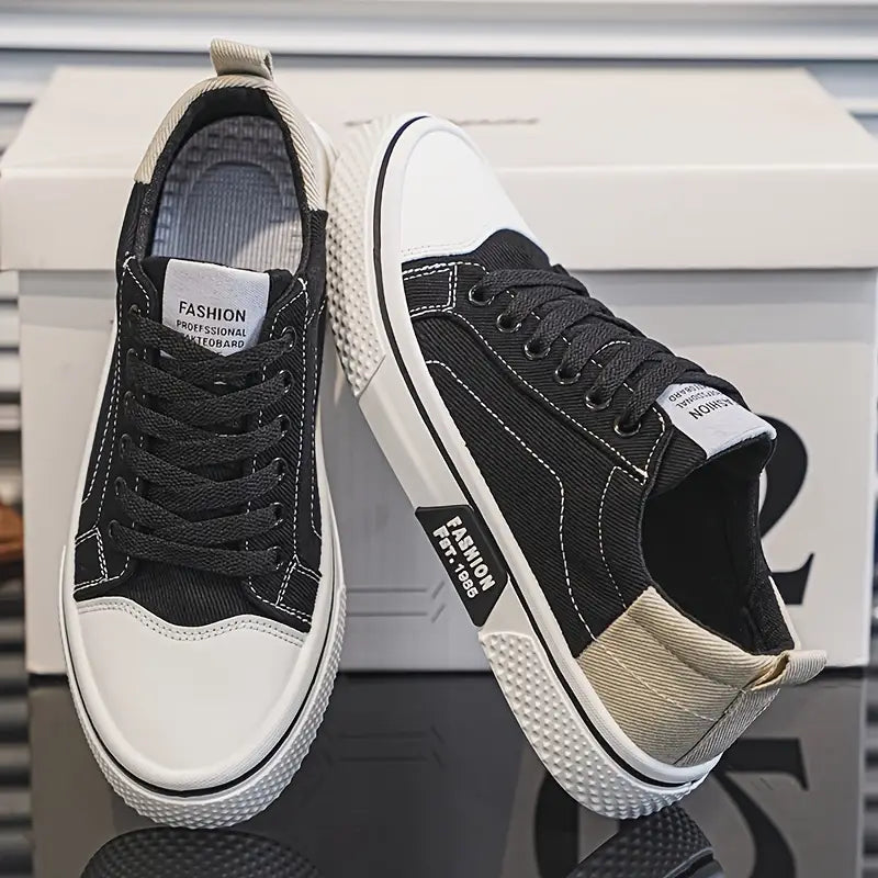 Men's low-top lace-up skate sneakers, black with white toe and side stripes
